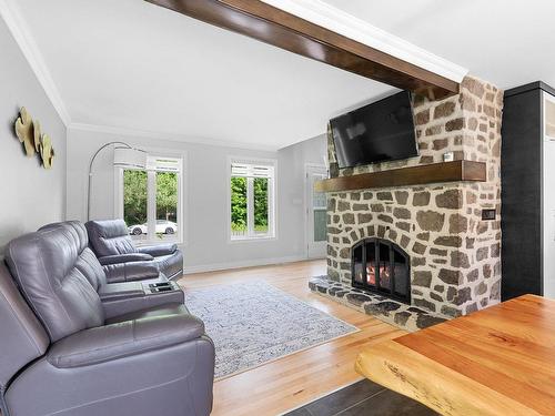 Salon - 1425 Rue Du Bourgeon, Lévis (Les Chutes-De-La-Chaudière-Ouest), QC - Indoor Photo Showing Living Room With Fireplace