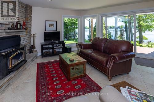 84 Cadillac Boulevard, Kawartha Lakes, ON - Indoor Photo Showing Living Room With Fireplace