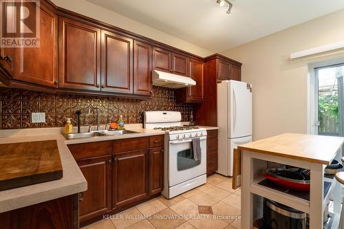 128 Park Street N, Hamilton, ON - Indoor Photo Showing Kitchen With Double Sink
