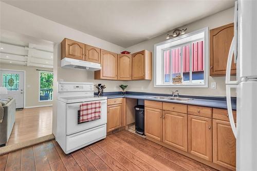 1315 Main Street E, Hamilton, ON - Indoor Photo Showing Kitchen With Double Sink