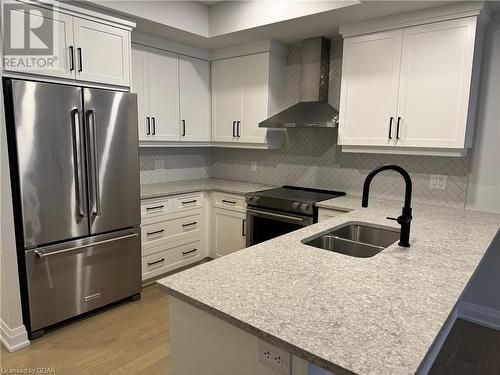 71 Wyndham Street S Unit# 203, Guelph, ON - Indoor Photo Showing Kitchen With Double Sink With Upgraded Kitchen