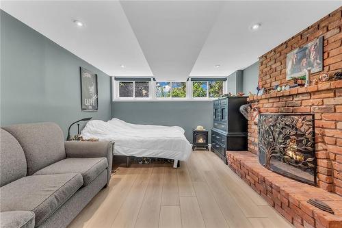 486 Winniett Street, Caledonia, ON - Indoor Photo Showing Bedroom With Fireplace