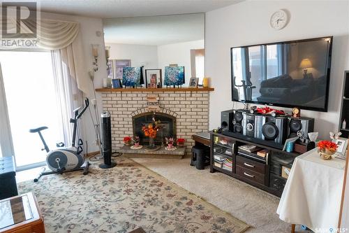 184 Plainsview Drive, Regina, SK - Indoor Photo Showing Other Room With Fireplace