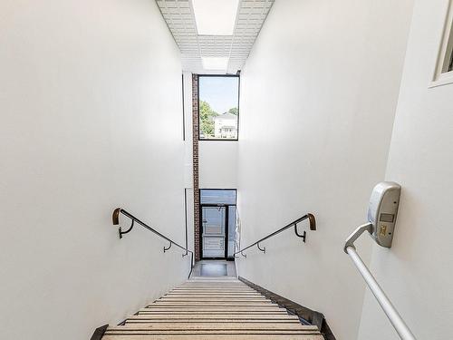 Staircase - 200-495  - 521 Rue Du Sud, Cowansville, QC - Indoor Photo Showing Other Room