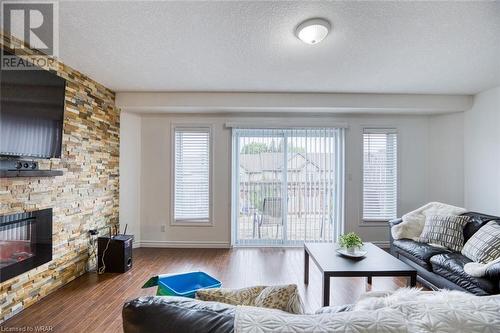 975 Strasburg Road Unit# 22B, Kitchener, ON - Indoor Photo Showing Living Room With Fireplace