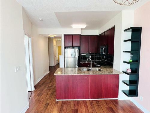 701-220 Burnhamthorpe Rd W, Mississauga, ON - Indoor Photo Showing Kitchen With Double Sink