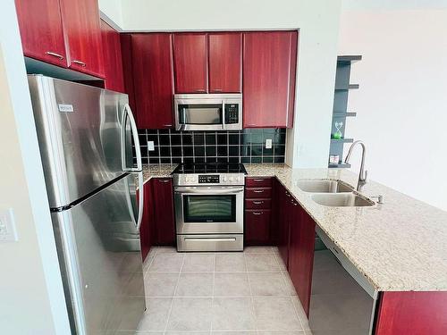 701-220 Burnhamthorpe Rd W, Mississauga, ON - Indoor Photo Showing Kitchen With Double Sink