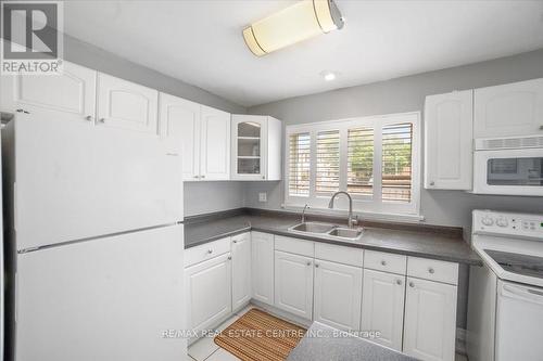 33 - 1020 Central Park Drive, Brampton, ON - Indoor Photo Showing Kitchen With Double Sink