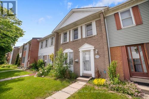 33 - 1020 Central Park Drive, Brampton, ON - Outdoor With Facade