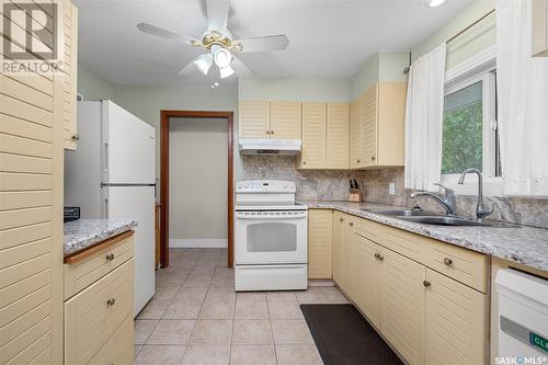 1116 3Rd Avenue Nw, Moose Jaw, SK - Indoor Photo Showing Kitchen With Double Sink