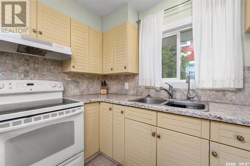 1116 3Rd Avenue Nw, Moose Jaw, SK - Indoor Photo Showing Kitchen With Double Sink