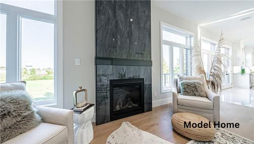 77 Workman Crescent, Plattsville, ON - Indoor Photo Showing Living Room With Fireplace