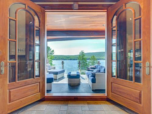 Balcony - 1054 Ch. Thomas-Maher, Lac-Saint-Joseph, QC - Indoor Photo Showing Other Room With Body Of Water