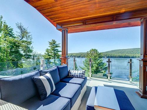 Balcony - 1054 Ch. Thomas-Maher, Lac-Saint-Joseph, QC - Outdoor With Body Of Water With Exterior