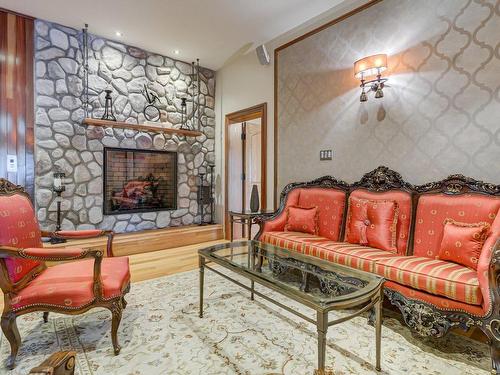 Family room - 1054 Ch. Thomas-Maher, Lac-Saint-Joseph, QC - Indoor Photo Showing Living Room With Fireplace