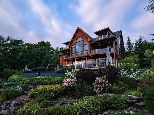 Back facade - 1054 Ch. Thomas-Maher, Lac-Saint-Joseph, QC - Outdoor