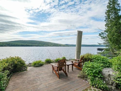 Waterfront - 1054 Ch. Thomas-Maher, Lac-Saint-Joseph, QC - Outdoor With Body Of Water With Deck Patio Veranda With View