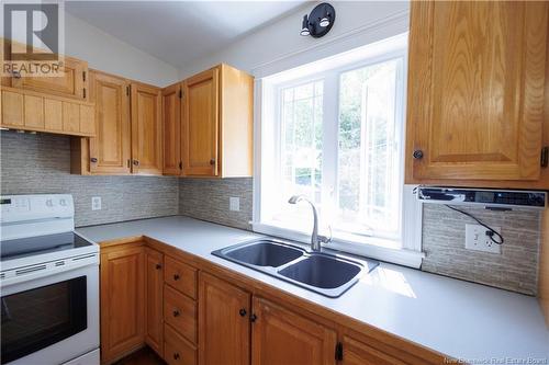 27 Nowlan Street, Grand Falls, NB - Indoor Photo Showing Kitchen With Double Sink