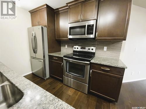 220 1220 Blackfoot Drive, Regina, SK - Indoor Photo Showing Kitchen With Stainless Steel Kitchen