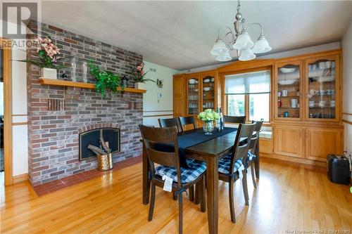 36 Elizabeth Parkway, Rothesay, NB - Indoor Photo Showing Dining Room With Fireplace