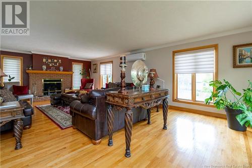 36 Elizabeth Parkway, Rothesay, NB - Indoor Photo Showing Living Room With Fireplace