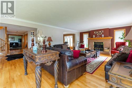 36 Elizabeth Parkway, Rothesay, NB - Indoor Photo Showing Living Room With Fireplace