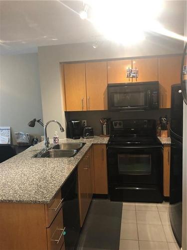 16 Yonge Street|Unit #1704, Toronto, ON - Indoor Photo Showing Kitchen With Double Sink