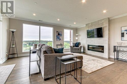 704 - 460 Callaway Road, London, ON - Indoor Photo Showing Living Room With Fireplace