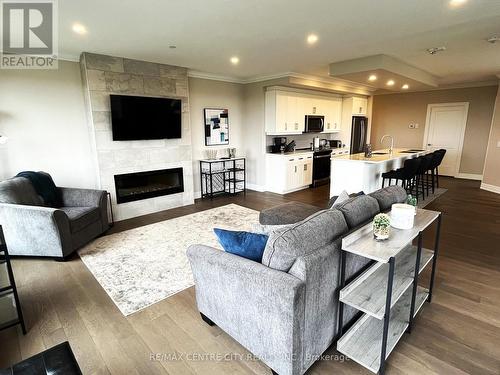 704 - 460 Callaway Road, London, ON - Indoor Photo Showing Living Room With Fireplace