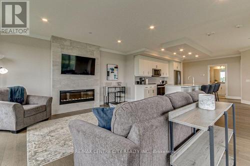 704 - 460 Callaway Road, London, ON - Indoor Photo Showing Living Room With Fireplace