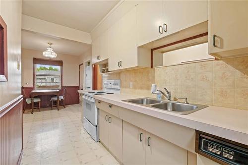643 Henderson Highway, Winnipeg, MB - Indoor Photo Showing Kitchen With Double Sink