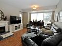 103-3550 Woodsdale Road, Lake Country, BC  - Indoor Photo Showing Living Room With Fireplace 