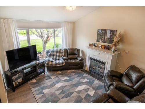 1512 Fir Crescent, Golden, BC - Indoor Photo Showing Living Room With Fireplace