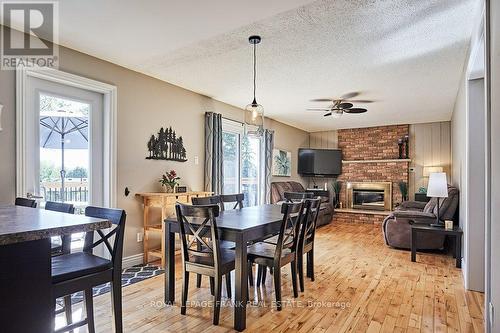 69 Heath Crescent, Scugog, ON - Indoor Photo Showing Dining Room With Fireplace