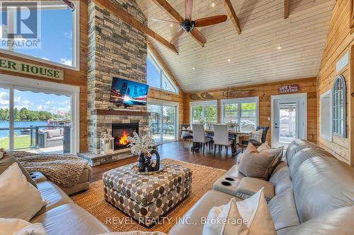 241 Raby'S Shore Drive, Kawartha Lakes (Fenelon Falls), ON - Indoor Photo Showing Living Room With Fireplace