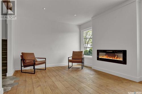 321 Durham Drive, Regina, SK - Indoor Photo Showing Living Room With Fireplace