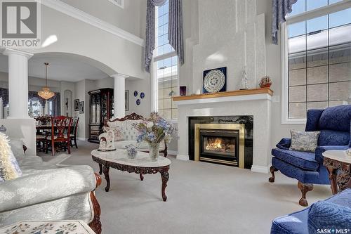 9407 Wascana Mews, Regina, SK - Indoor Photo Showing Living Room With Fireplace