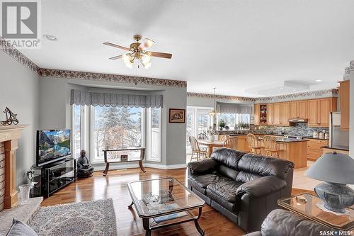 9407 Wascana Mews, Regina, SK - Indoor Photo Showing Living Room With Fireplace