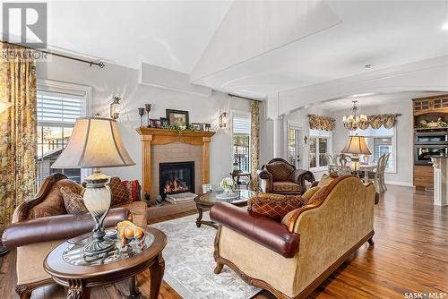 2 533 4Th Avenue Ne, Swift Current, SK - Indoor Photo Showing Living Room With Fireplace