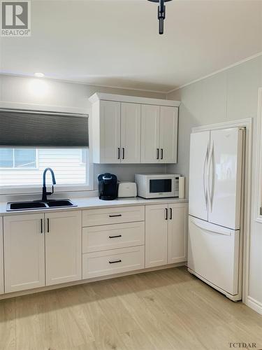 30 Aurora Ave, Kapuskasing, ON - Indoor Photo Showing Kitchen With Double Sink