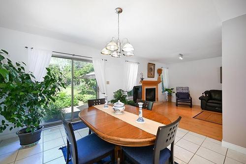 543 John Street N, Hamilton, ON - Indoor Photo Showing Dining Room With Fireplace