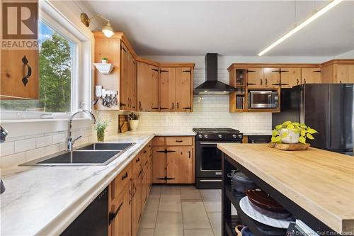 10252 Route 105, Beechwood, NB - Indoor Photo Showing Kitchen With Double Sink