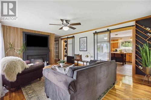 10252 Route 105, Beechwood, NB - Indoor Photo Showing Living Room With Fireplace