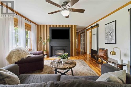 10252 Route 105, Beechwood, NB - Indoor Photo Showing Living Room With Fireplace