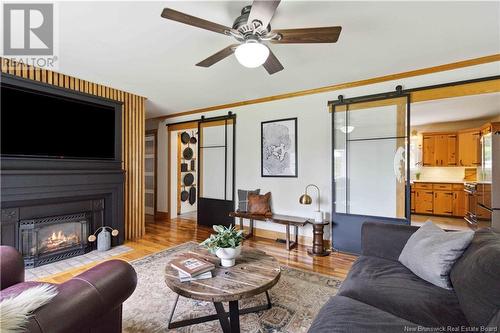 10252 Route 105, Beechwood, NB - Indoor Photo Showing Living Room With Fireplace