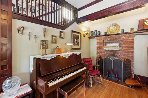 702 Mill Street, Nelson, BC - Indoor Photo Showing Other Room With Fireplace