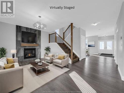 1908 Villa Canal Drive, Kingsville, ON - Indoor Photo Showing Living Room With Fireplace