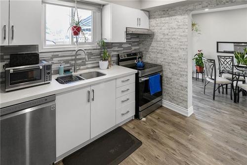 126 Walter Avenue N, Hamilton, ON - Indoor Photo Showing Kitchen With Double Sink