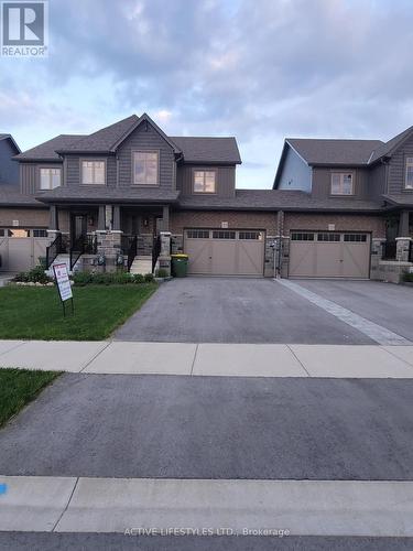 135 Stonebrook Way, Grey Highlands (Markdale), ON - Outdoor With Facade