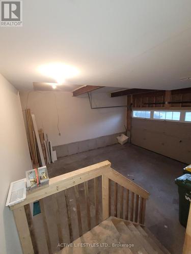 135 Stonebrook Way, Grey Highlands (Markdale), ON - Indoor Photo Showing Garage